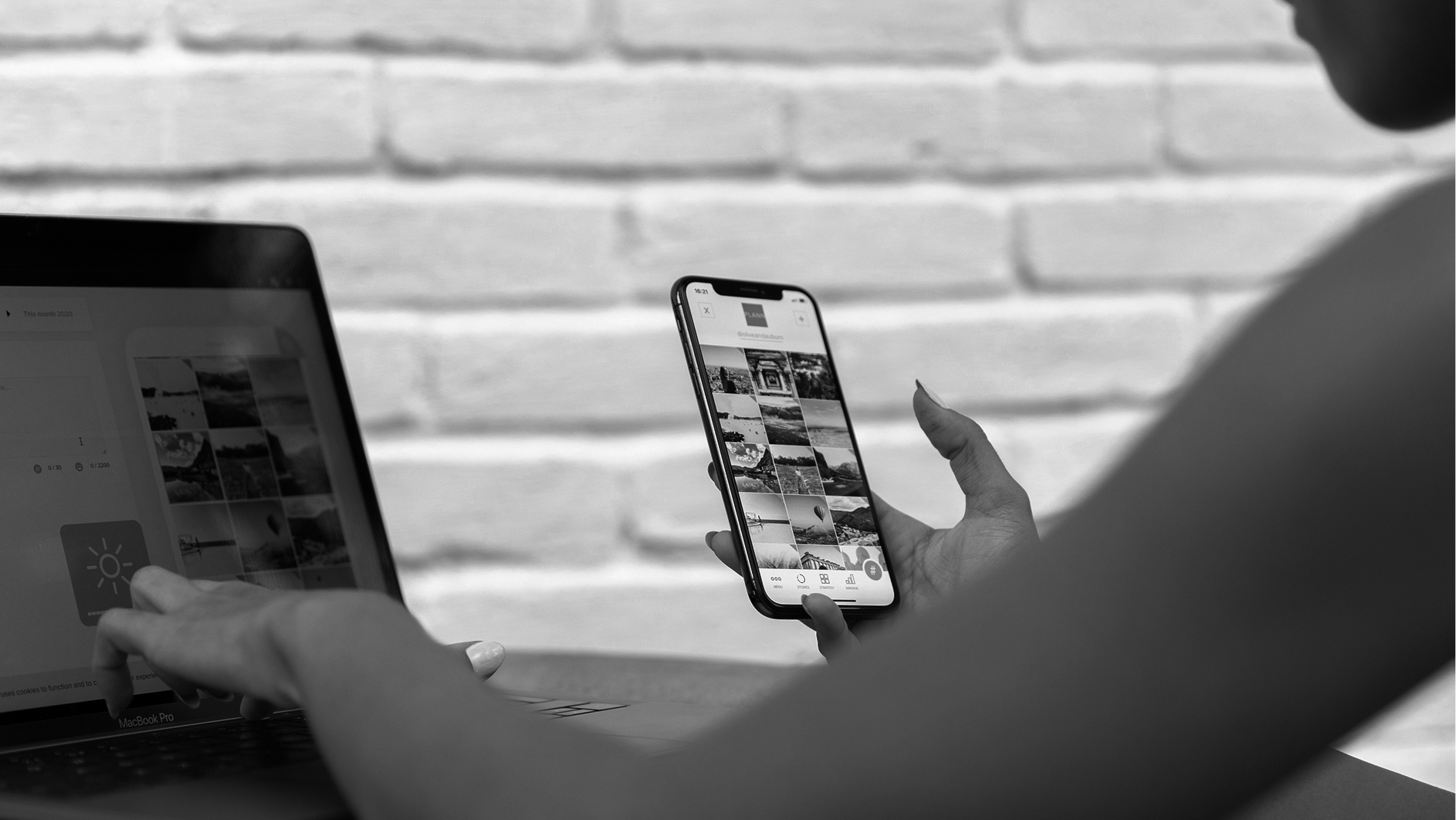 Woman using multiple screens to track her work